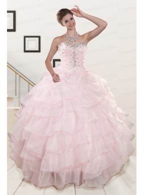 Unique Baby Pink Quinceanera Dress with Beading and Ruffles