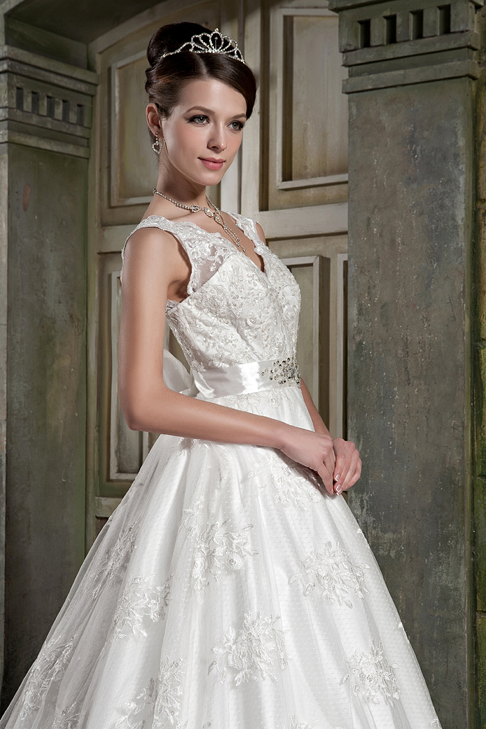 Beautiful A-line V-neck Chapel Train Lace Beading Wedding Dress