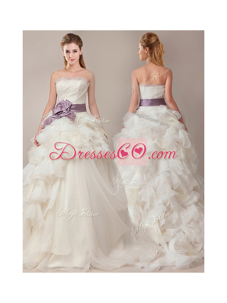 Ball Gown Strapless Sophisticated Ruffled and Sashed Wedding Dress with Brush Train