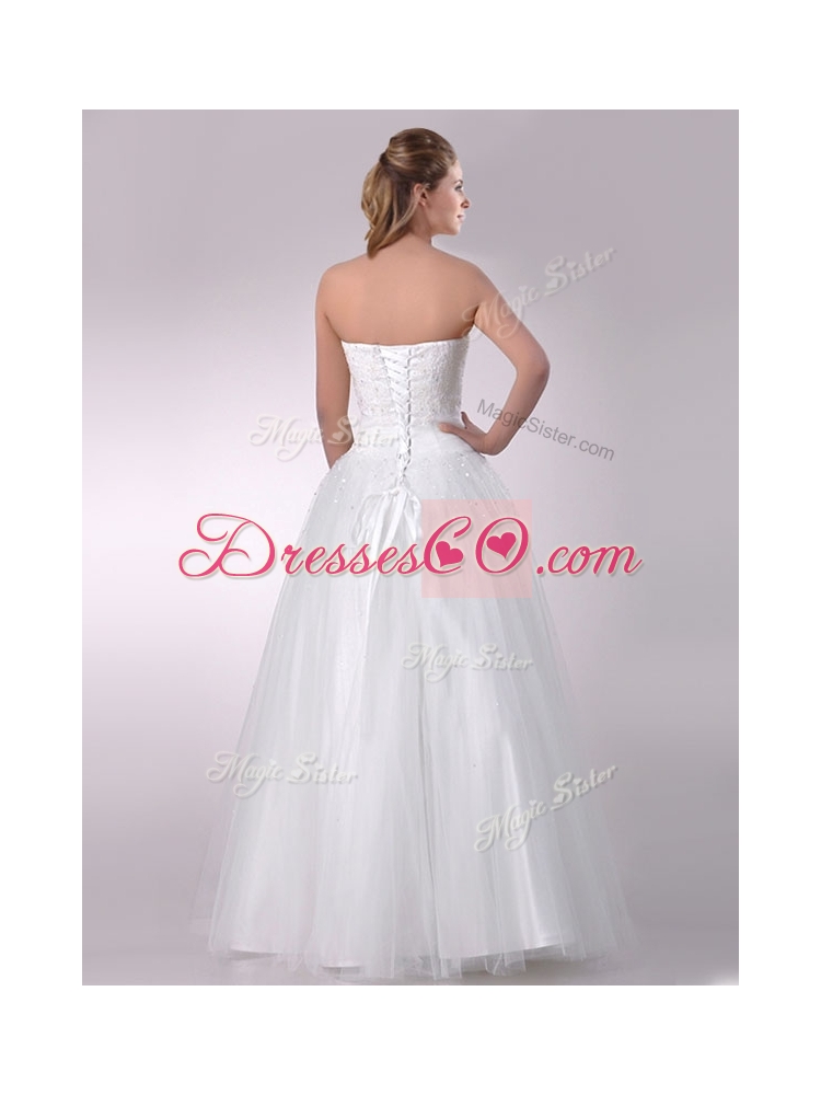 Sophisticated A Line Strapless Beaded Wedding Dress in Tulle for