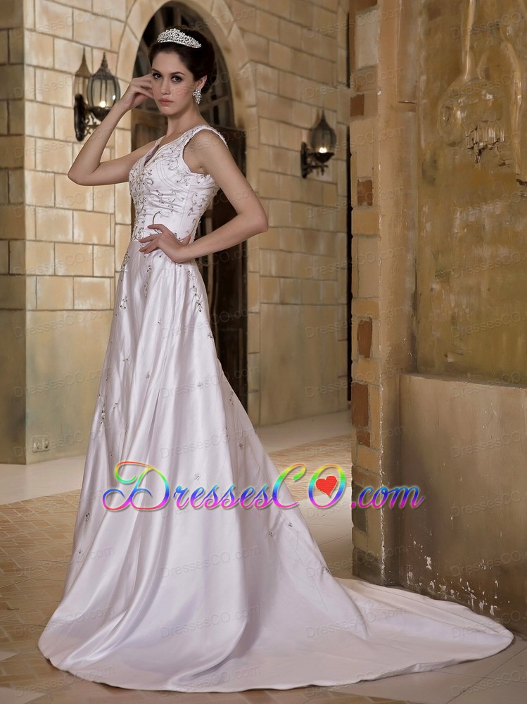 Luxurious A-line V-neck Chapel Train Taffeta Beading Wedding Dress