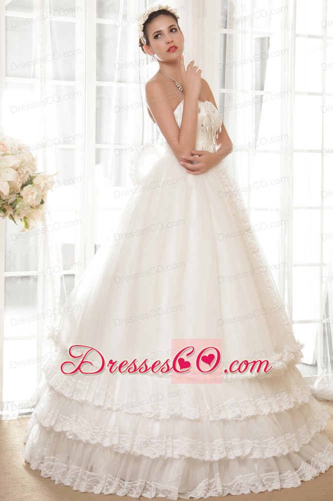 Luxurious A-line Strapless Long Tulle And Taffeta Hand Made Flowers And Beading Wedding Dress